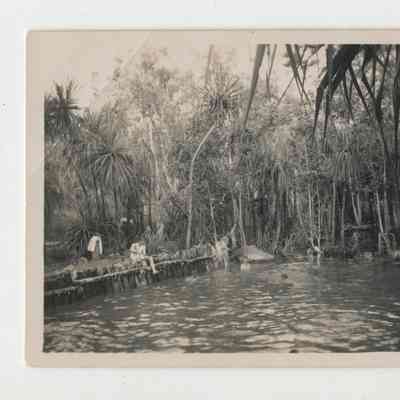 Six (6) Unidentified Men Bathing in a Dam