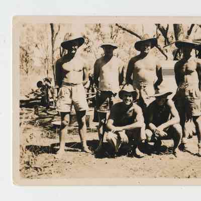 Six (6) Australian Soldiers Standing in Front of a Military Vehicle