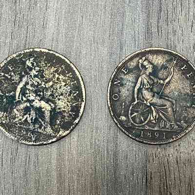 2023.62.2 & 2023.62.3: Two 19th century Queen Victoria pennies, showing tails and wear