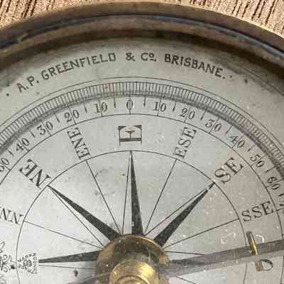 2023.25: Detail of paper dial showing the logo of the manufacturer and name of distributor.