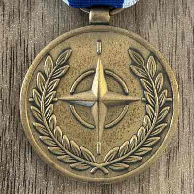 2023.7.5.1r: Detail of NATO medal, recto.