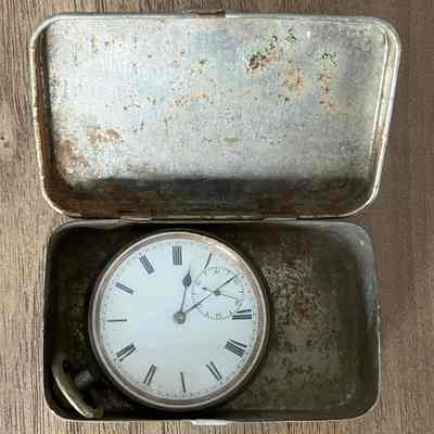 2023.24.1-2: Pocket watch in tin.