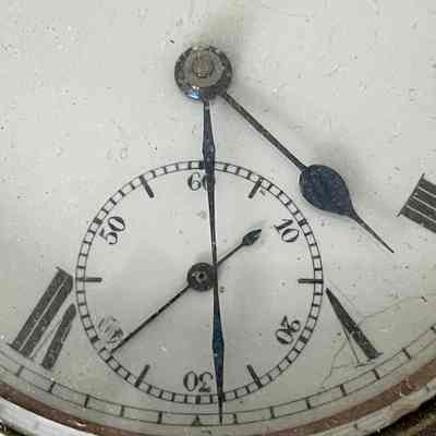 2023.24.1: Close up of seconds dial showing fractures to face and paint wear to numerals.