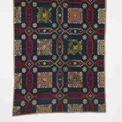 Geometric coverlet; summer and winter embroidered