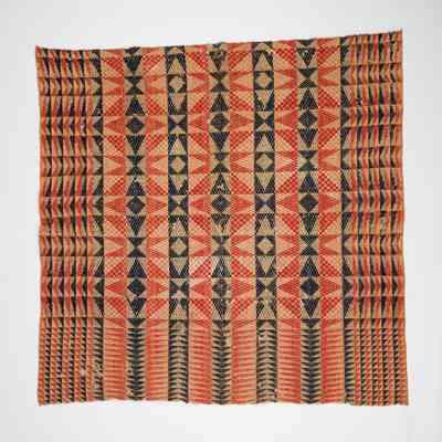 Geometric crib coverlet; overshot