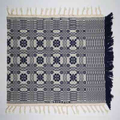 Pennsylvania geometric crib coverlet; overshot; William Leinbach 1987