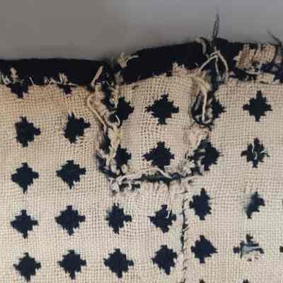 Repair: Patch located on top hem along center seam