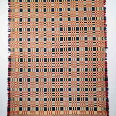 Geometric coverlet; overshot