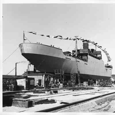 Man climbing ladder on Clement T. Jayne at Leathem D. Smith Shipbuilding Co.
