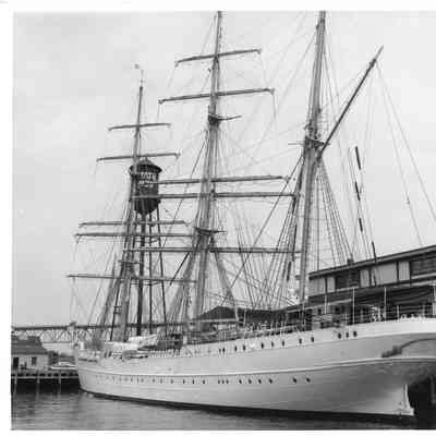 USCGC Eagle dockside tower in background