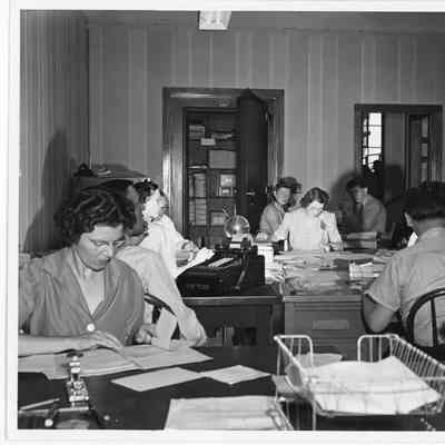Men and women employees in L.D. Smith Shipbuilding Co. office