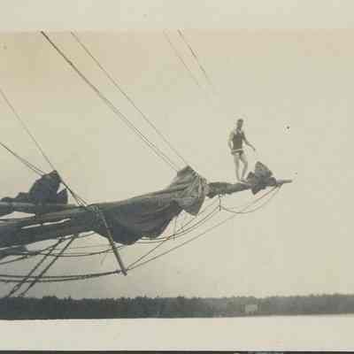 Man diving off jib of the Cora