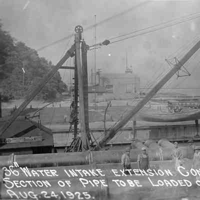 Section of pipe to be loaded on scow August 24, 1925