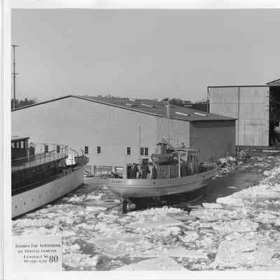 US Army L-97 in icy water outside of Sturgeon Bay Shipbuilding and Dry Dock Co.