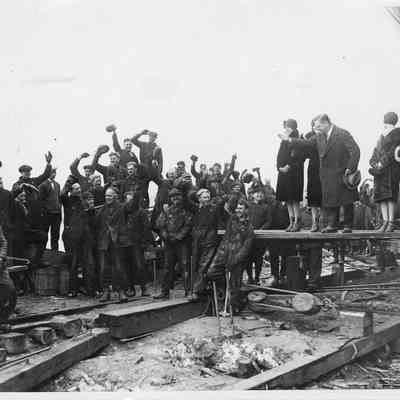 Group cheering post launch mid-1920s