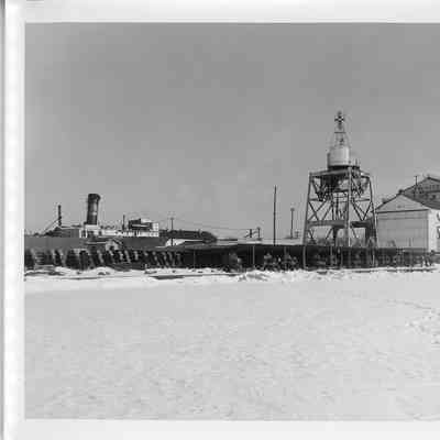 Hull of Spartan under construction in snow January 9, 1951