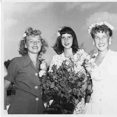 Patsy Smith, Miss Joan Burgess holding roses, Suzanne smith at PC-1175 christening