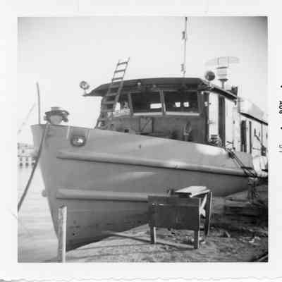 Docked boat August 1957