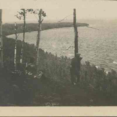 Couple on bluff above Judville Bay 1919