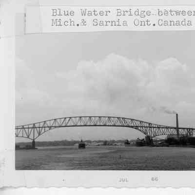 Ship under blue water bridge May 16, 1966