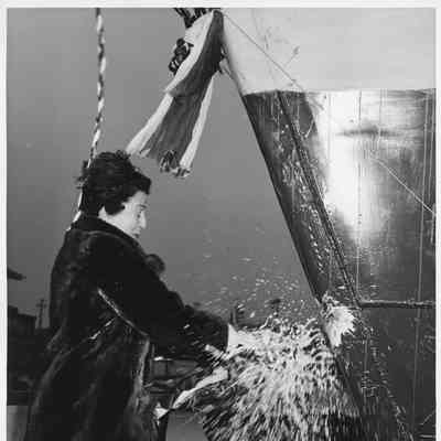 Woman sponsoring vessel at Leathem D. Smith Shipbuilding Co.