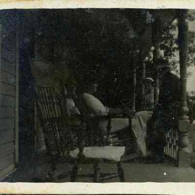 Several people on a porch
