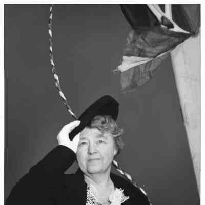 Mrs. William E. Wagener holding hat