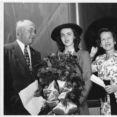 Leathem D. Smith and Alva Smith with ship sponsor at christening of AK-207 USS Richland