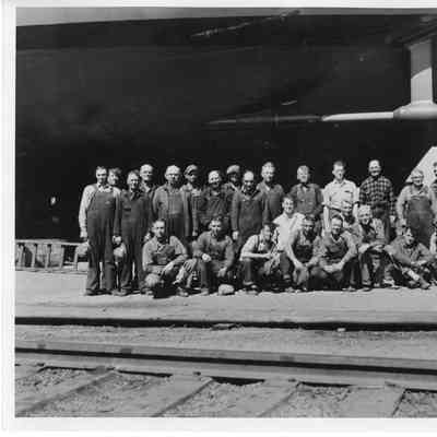 Group of shipyard workers posing at SBSB&DD Co.