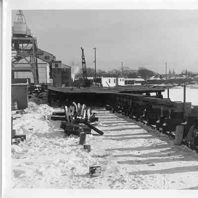 Hull of Spartan under construction in snow January 9, 1951