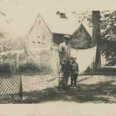 Leo and Billy in front of gill net 1920