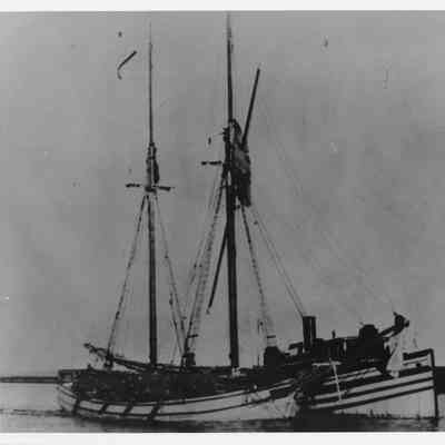 Petrel alongside another schooner