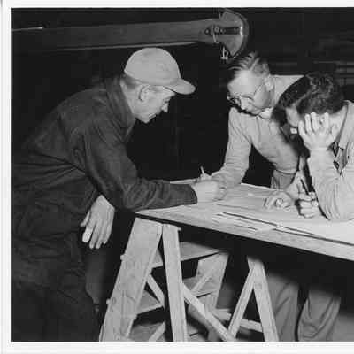 Harris Pfeiffer, Palmer Johson, Joe Fischer, shown in mold loft at Palmer Johsnon 1953