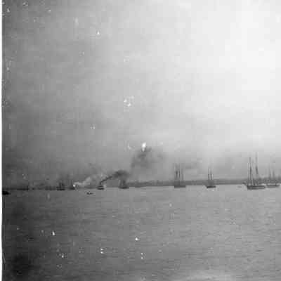 ships waiting to be towed through canal in 1890s