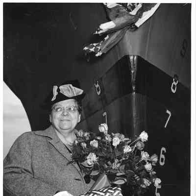 Mrs. Theodore E. Lyman at christening of AN-88 Shakamaton