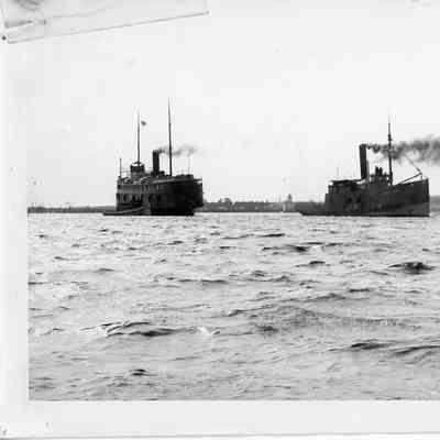 Four vessels in harbor