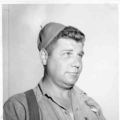 Man wearing Beanie and LD Smith employee badge