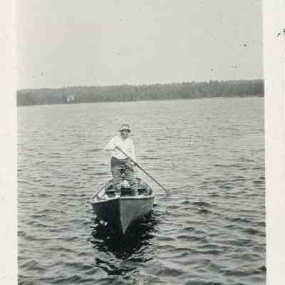 Man steers boat