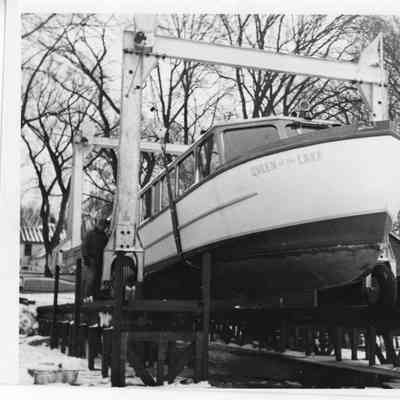 Queen of the Lake in boat hoist