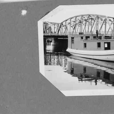 Fishing tug Golden Girl with Michigan Street Bridge in background