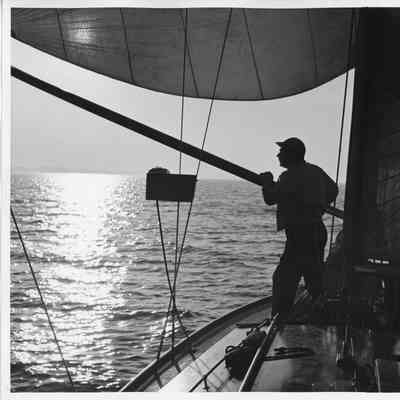 Unidentified man on Half moon on open water