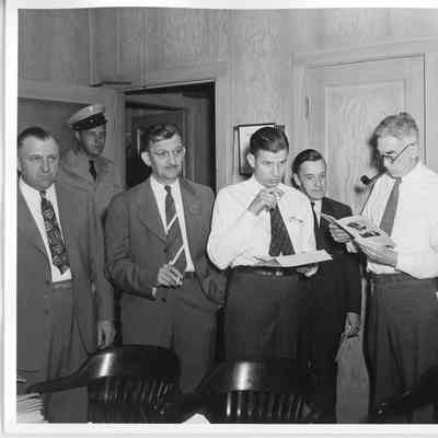 C. Ray Christianson, Wolcott E. Spofford, Thomas M. Woodward
