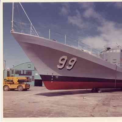 PBI Navy PG-99 USS Beacon on dollies in yard