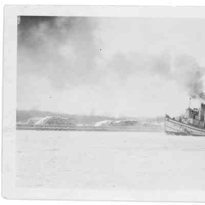 Tugboat Leathem D. Smith tug in canal with fishing tug in background