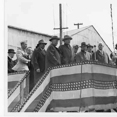 C. Ray Christianson and Leathem D. Smith in sponsor box at launching of PC-588