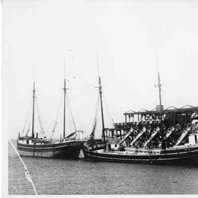 Schooner Arenac and W.K. Moore docked
