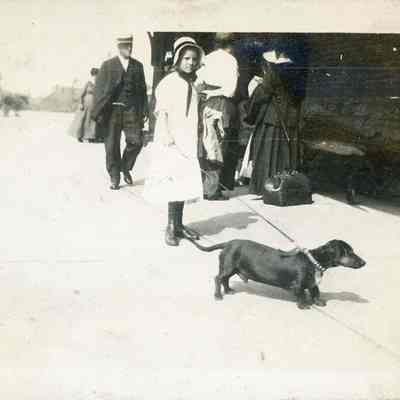 young girl with dachshund