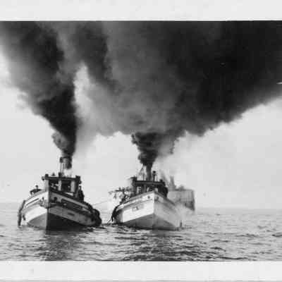 Tugboat Bob Teed and another tugboat towing larger vessel