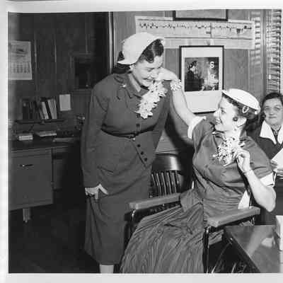 Three women in Christy Corp office during Christening of LST-1170 May 22, 1954