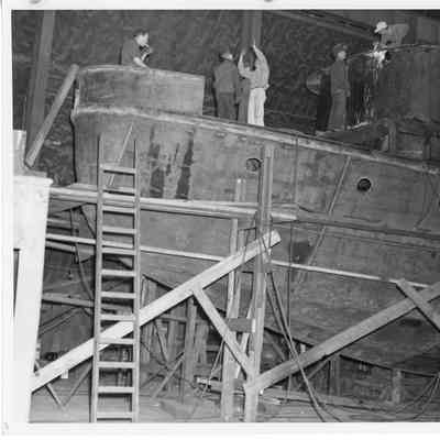 Men constructing Chicago Fire Boat at Christy Corp